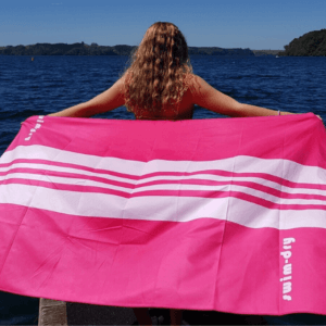 Large-Beach-Towel-SeaBreeze-Curve-Pinkwhite-girl-on-beach